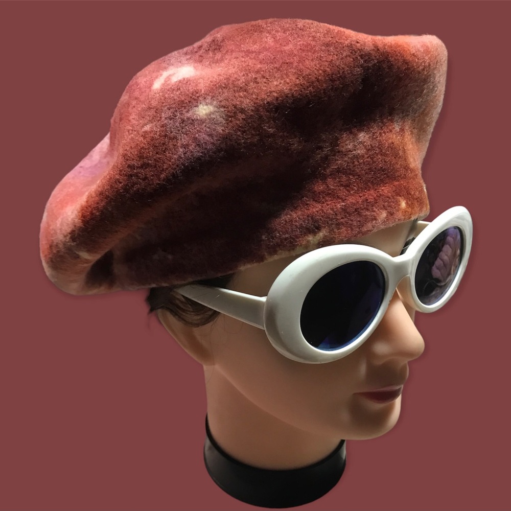 Wool felt beret with tie dye earth tone peach and pink colors.